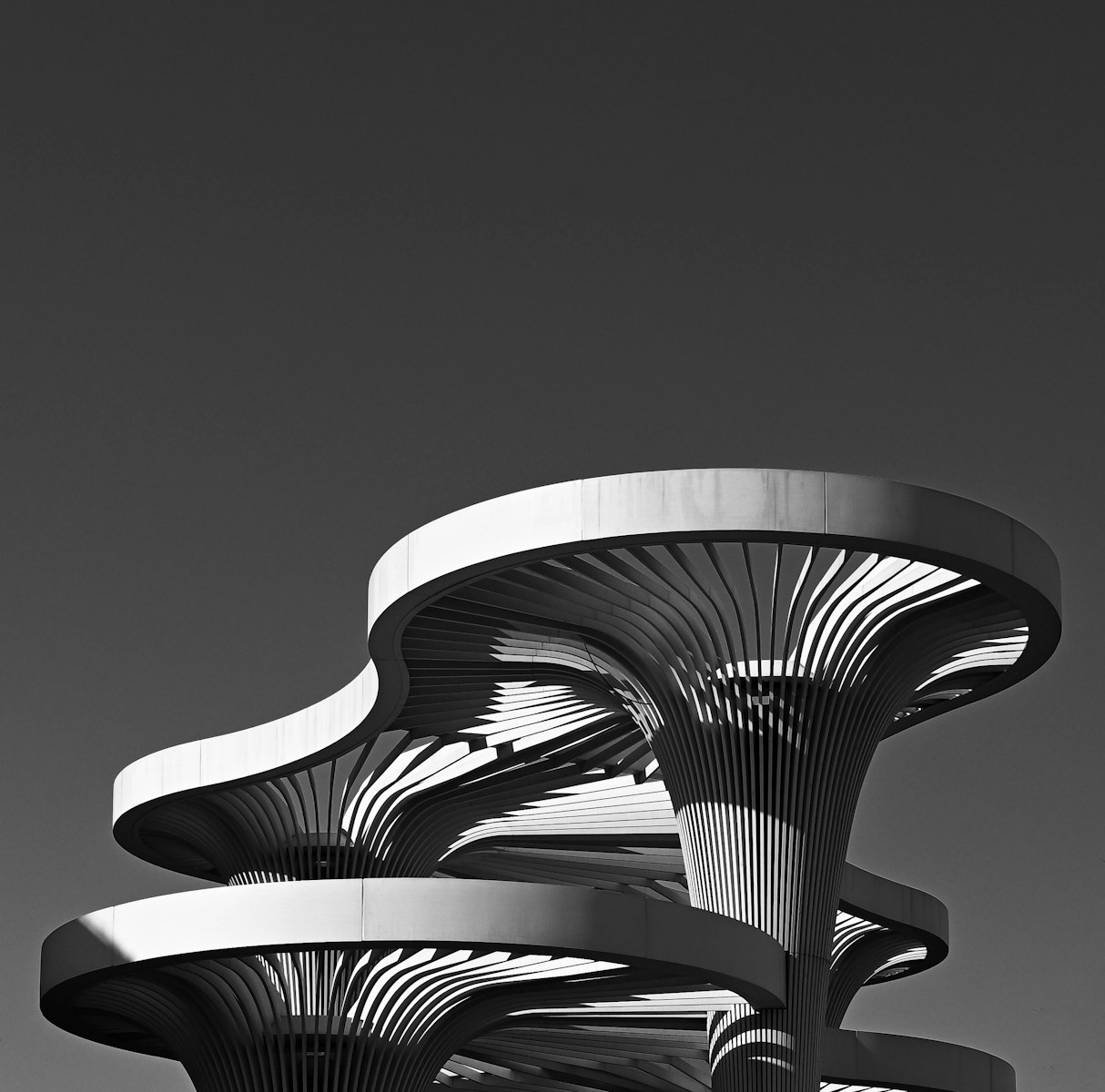 Modern architecture with unique, curved structures.